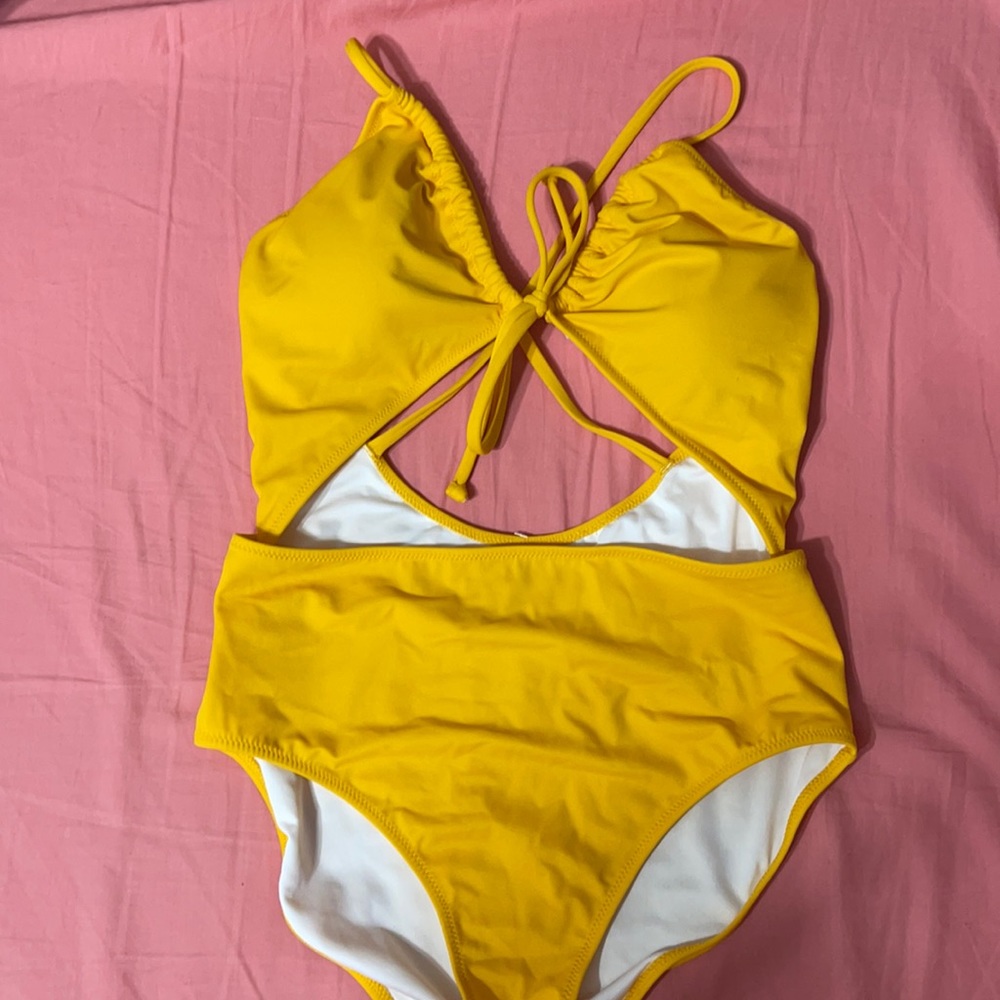 VS Pink yellow one piece size medium